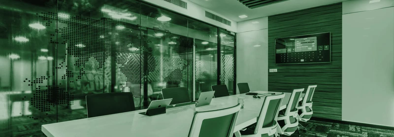 A boardroom table set for a meeting